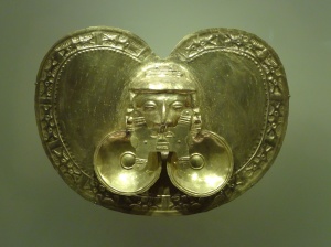 Close up of a gold chest plate. Wearers portrayed themselves as semi-divine by wearing gold pieces. 
